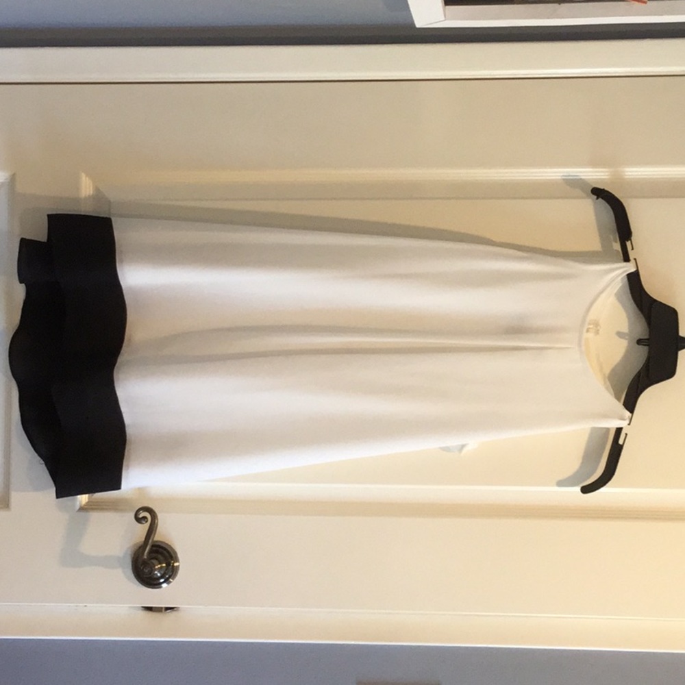 A white Macy’s girls dress